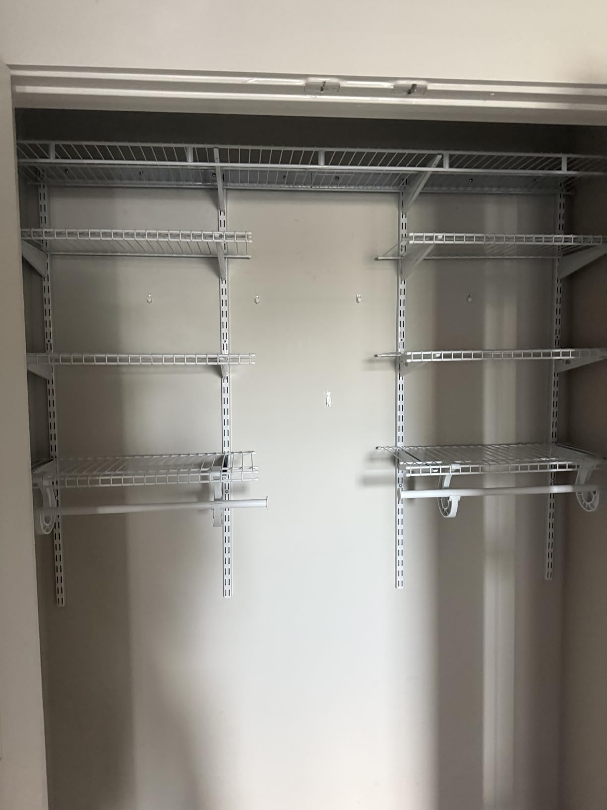 ClosetMaid ShelfTrack Wire Closet Organizer System, Adjustable from 4 to 6 Ft., With Shelves, Clothes Rods, Hardware, Durable Steel, White customer photo 1