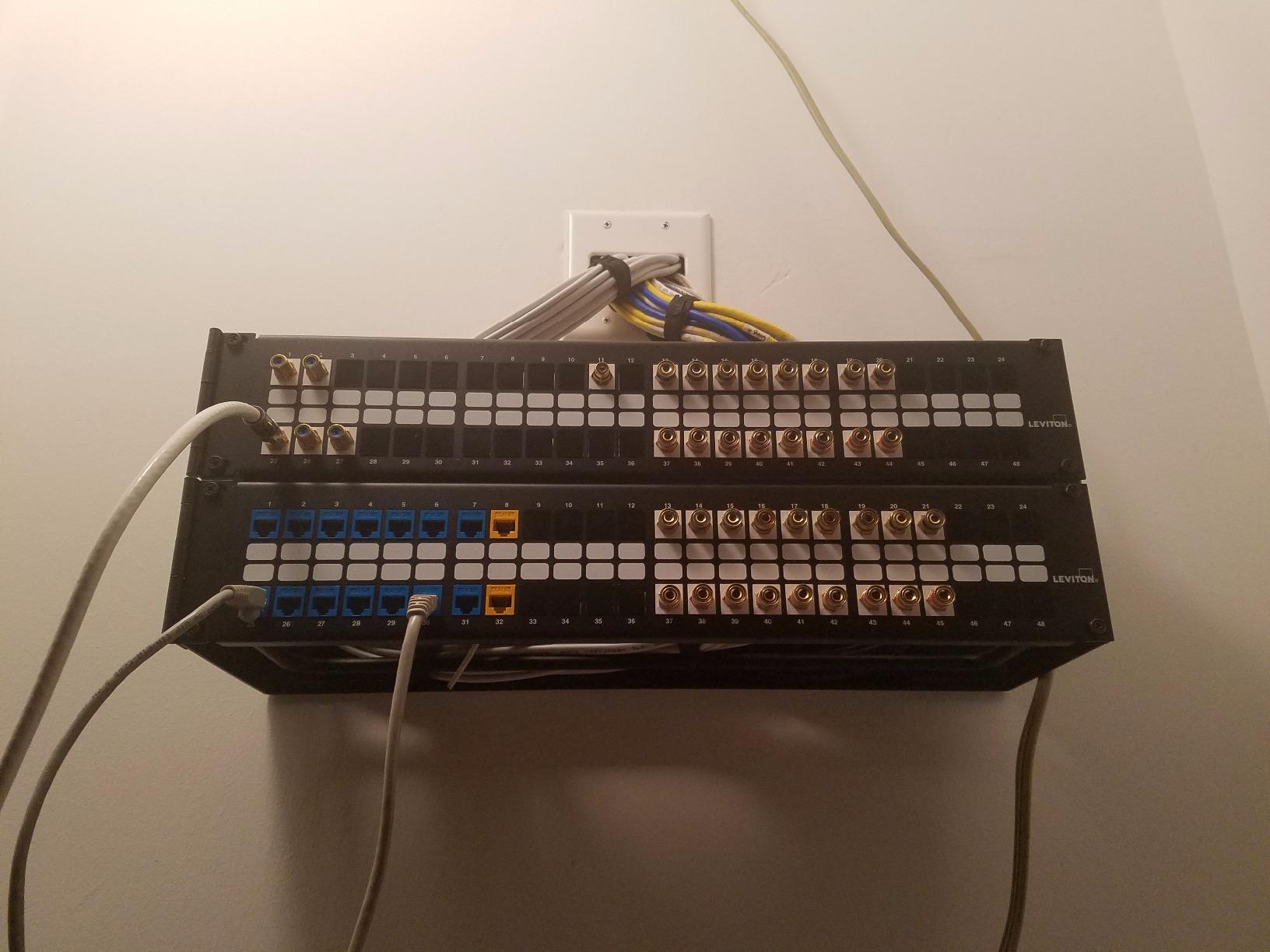 Leviton 49255-H24 QuickPort Patch Panel, 24-Port, 1RU, Cable Management Bar Included, Metal, Black customer photo 2