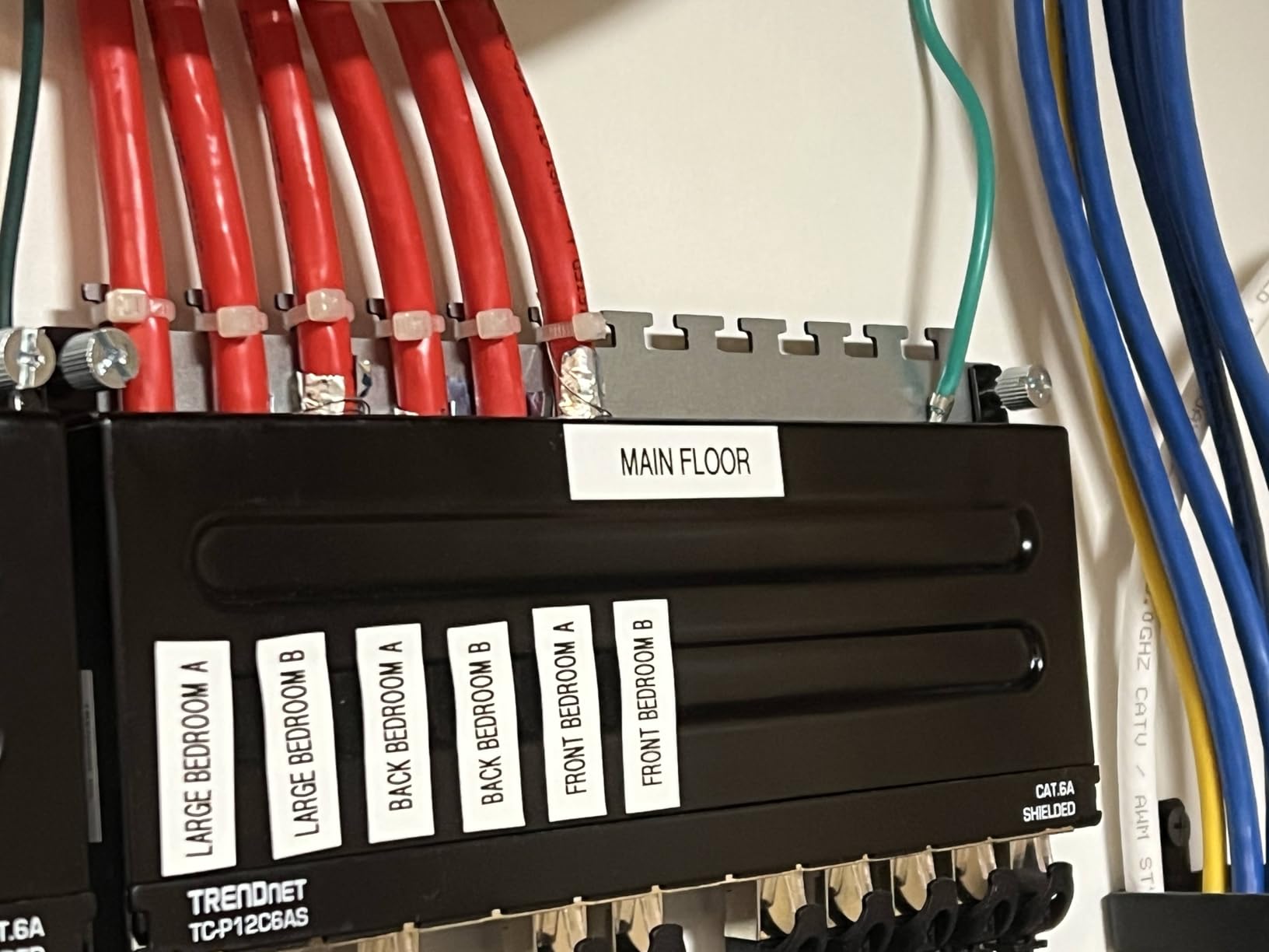 TRENDnet 12-Port Cat6A Shielded Patch Panel, 10G Ready, TC-P12C6AS | Cat5e,Cat6,Cat6A Compatible, Metal Housing, Color-Coded Labeling for T568A and T568B Wiring, Cable Management, Wall Mountable customer photo 1